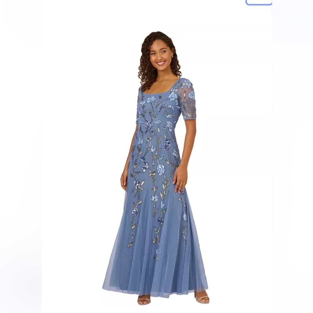 Elegant Blue Dress with Floral Details